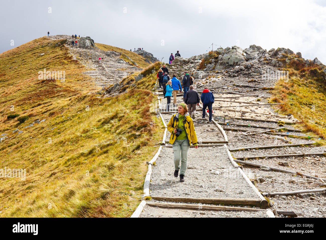 Zakopane, POLAND - September 13: Group of tourists walk to the top of the Kasprowy Wierch in Tatra Mountains on September 13, 20 Stock Photo