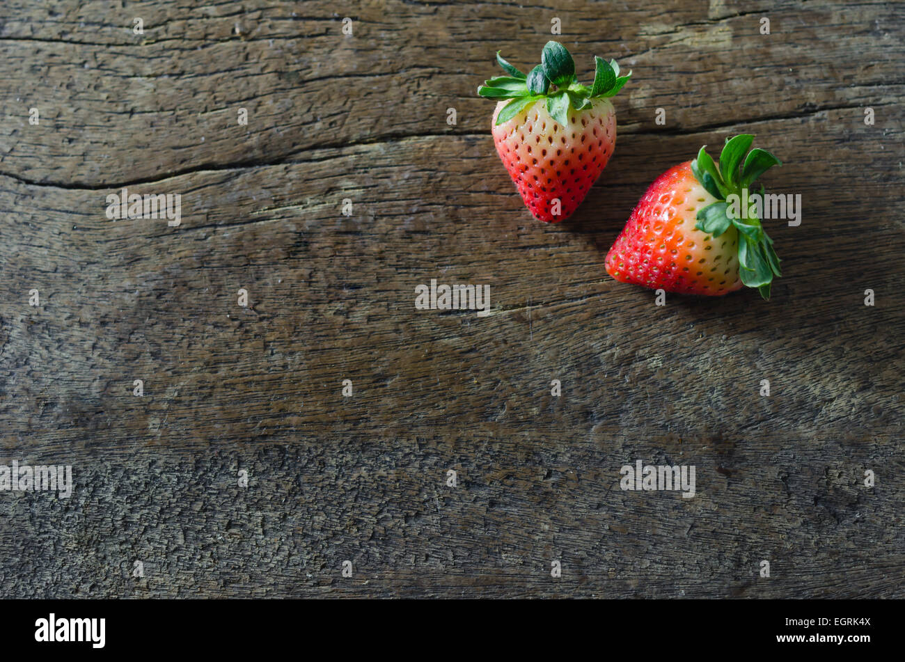 still life fresh strawberries over wooden background Stock Photo - Alamy