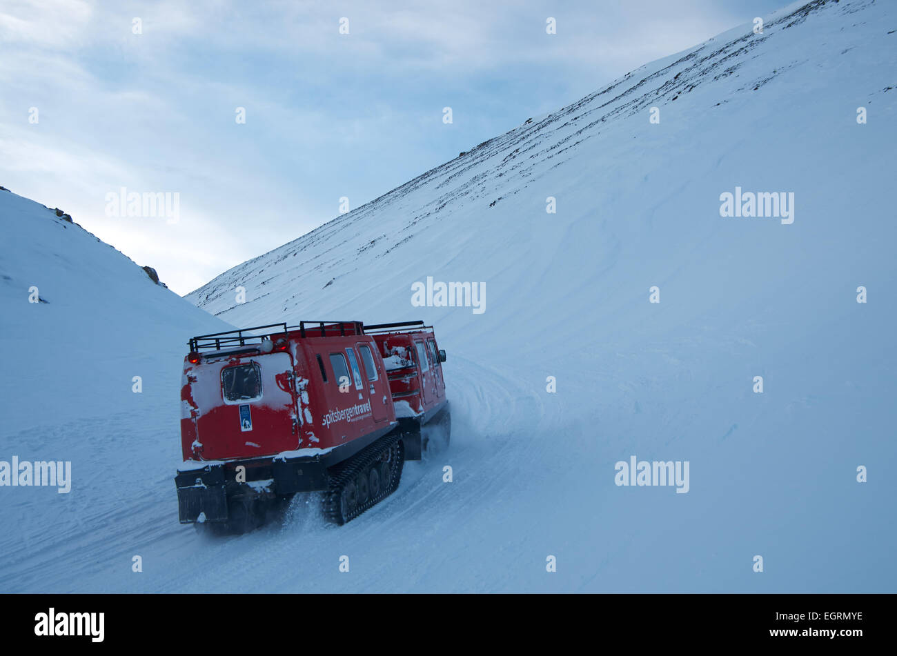 Belt wagon on its way to Longyear Glacier Svalbard Stock Photo