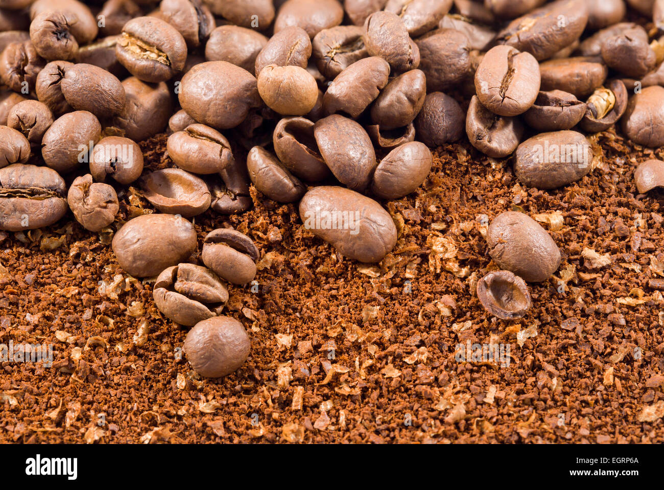 Picture of a group of coffee beans with coffee powder Stock Photo