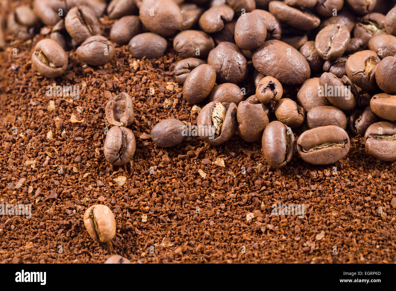 Picture of a group of coffee beans with coffee powder Stock Photo