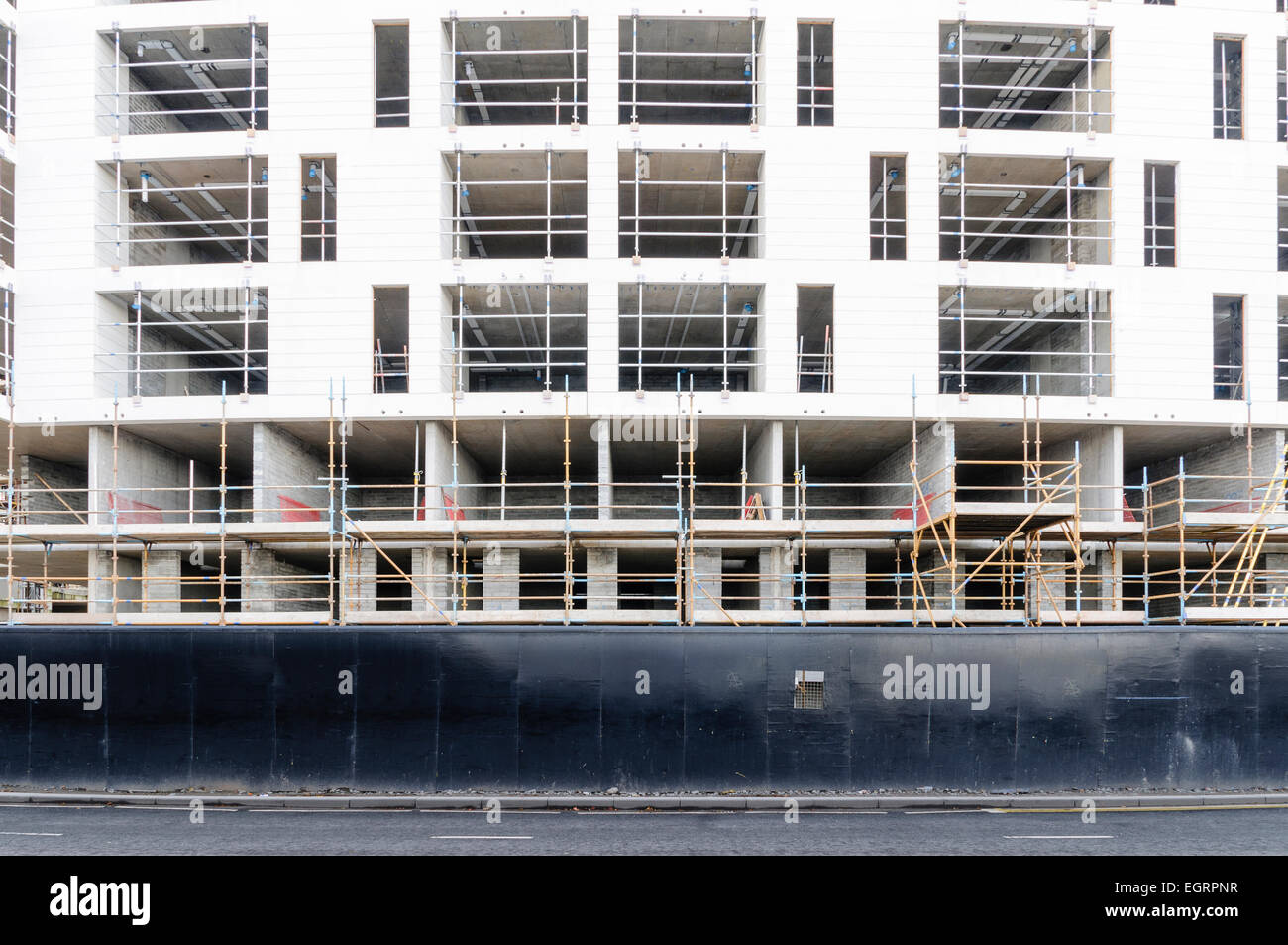 Construction concrete block apartment building hires stock photography