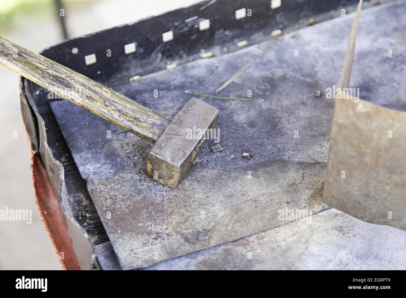 Hammer hitting metal, detail of a tool for blacksmiths Stock Photo Alamy
