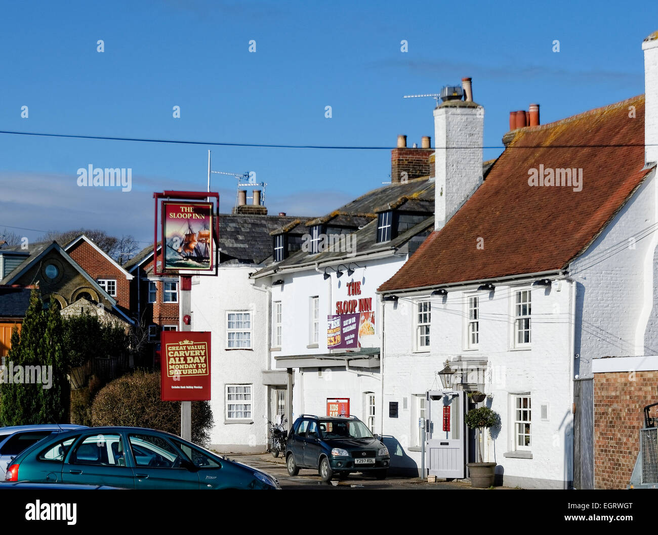 The Sloop Inn at Wootton Bridge, Isle of Wight, is a 19th century ferry landing point where yachts are now moored Stock Photo