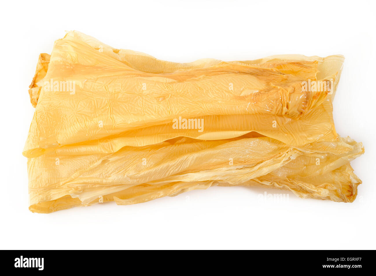 Dried tofu skin on white background Stock Photo Alamy