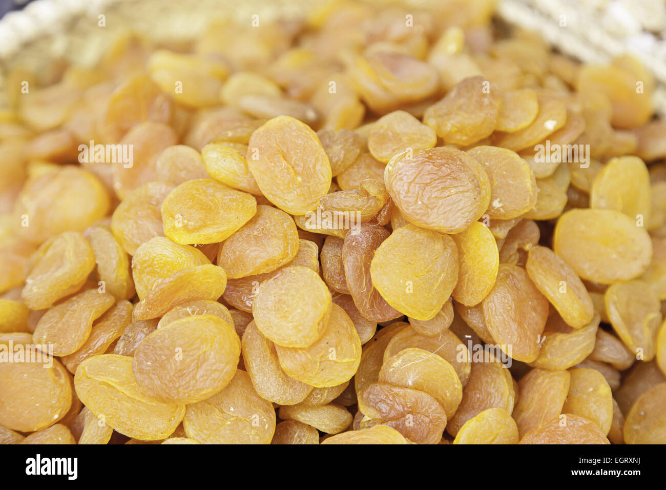 Dried apricots on a market, detail of dried fruit, healthy lifestyle