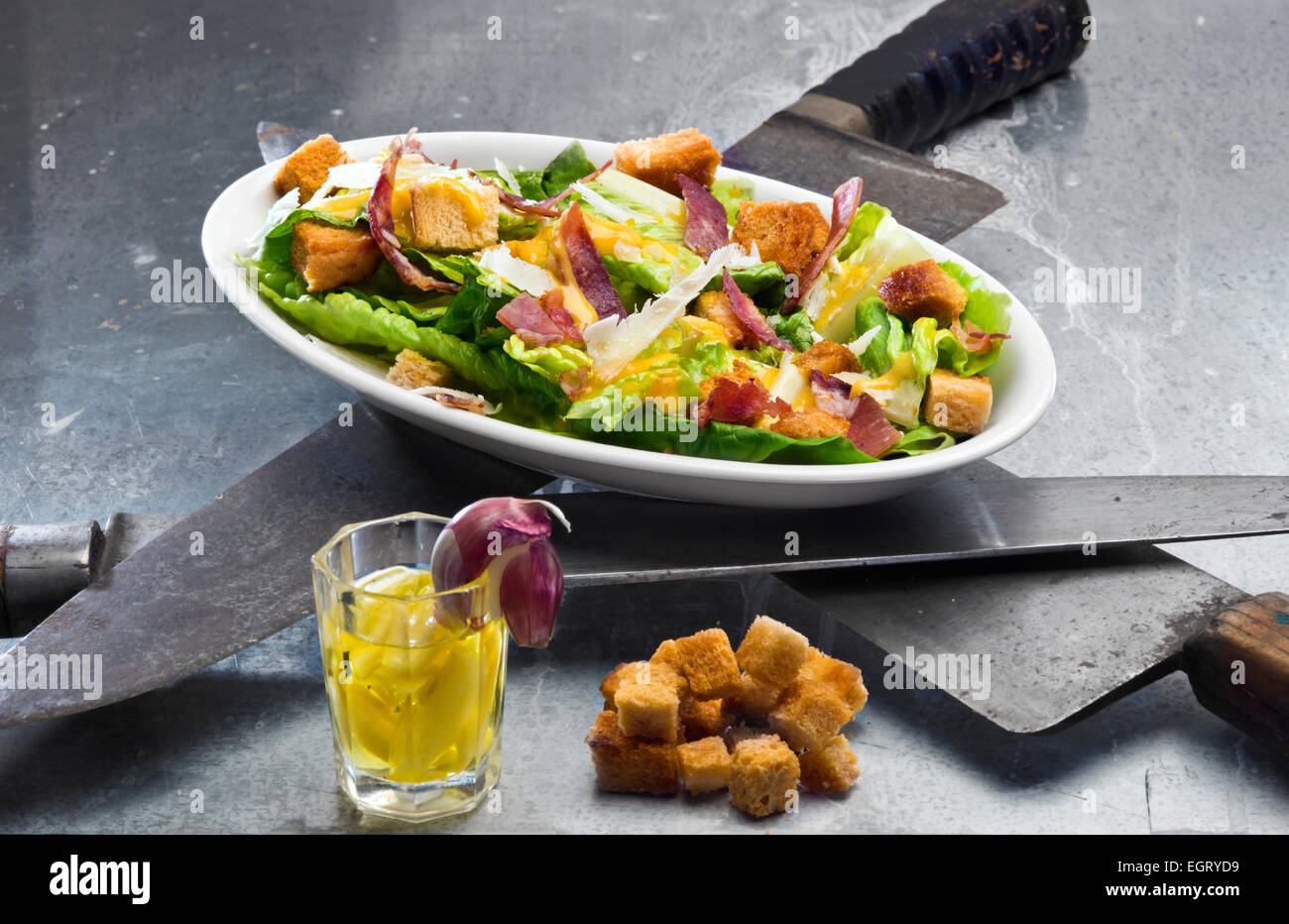 Caesar salad original version with egg dressing and crunchy bacon
