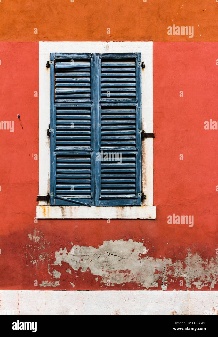A closed window on an old red wall in Venice, Italy Stock Photo - Alamy