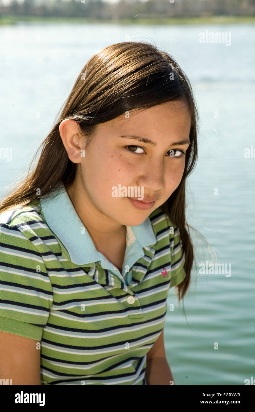 Teenage Vietnamese/Caucasian girl 11-13 year years old looking camera multicultural multi racial interracial racially mixed mix MR  © Myrleen Pearson Stock Photo