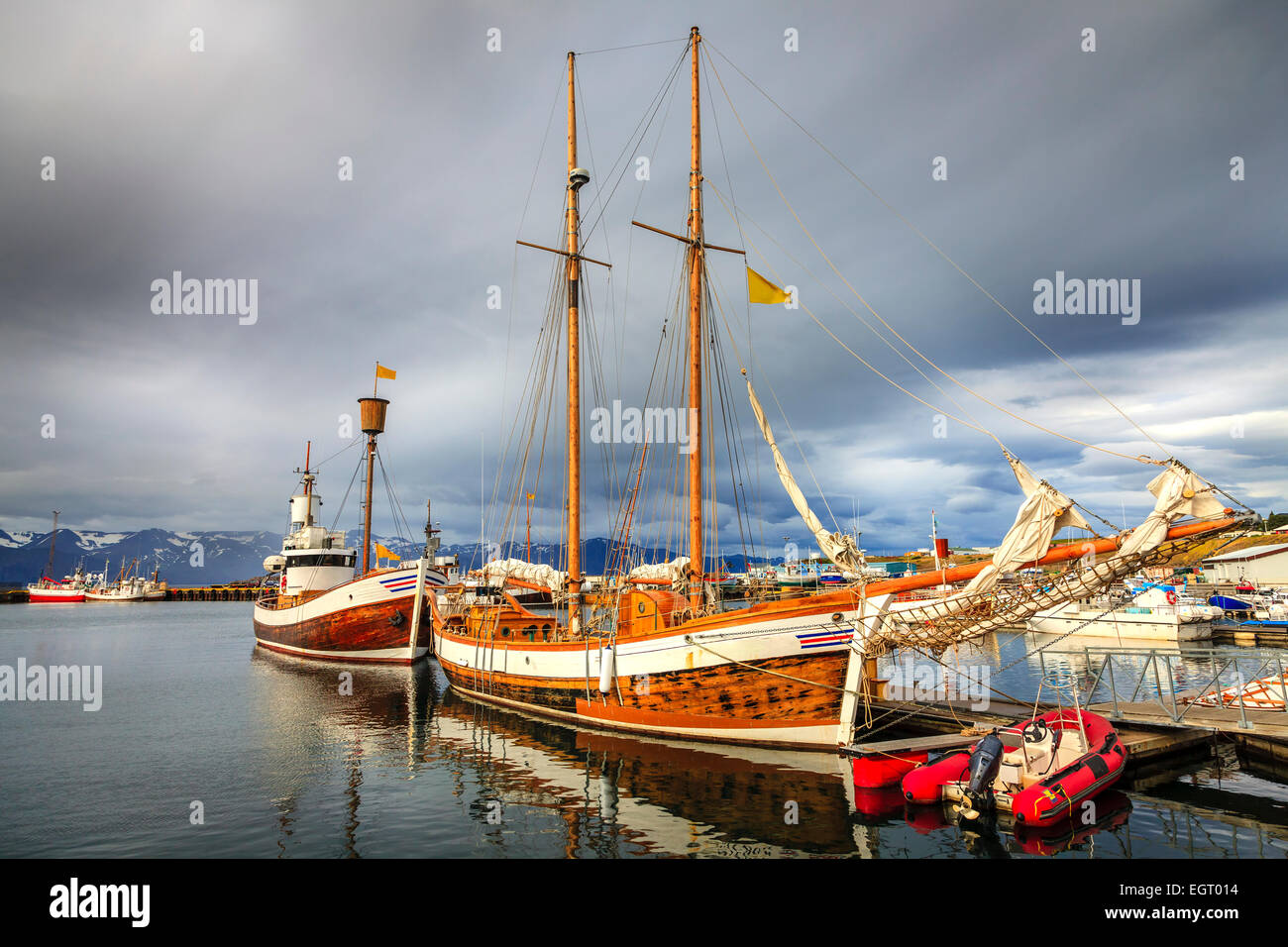Harbor of Husavik in Northern Iceland with whale watching boats Stock ...