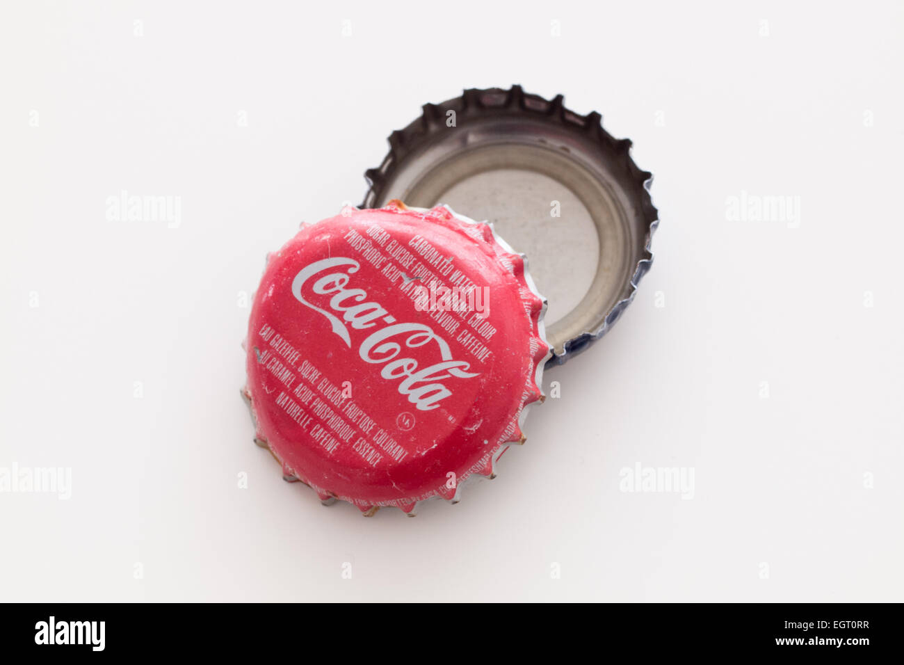 A Coca-Cola bottle cap (Coca-Cola bottle caps). Stock Photo