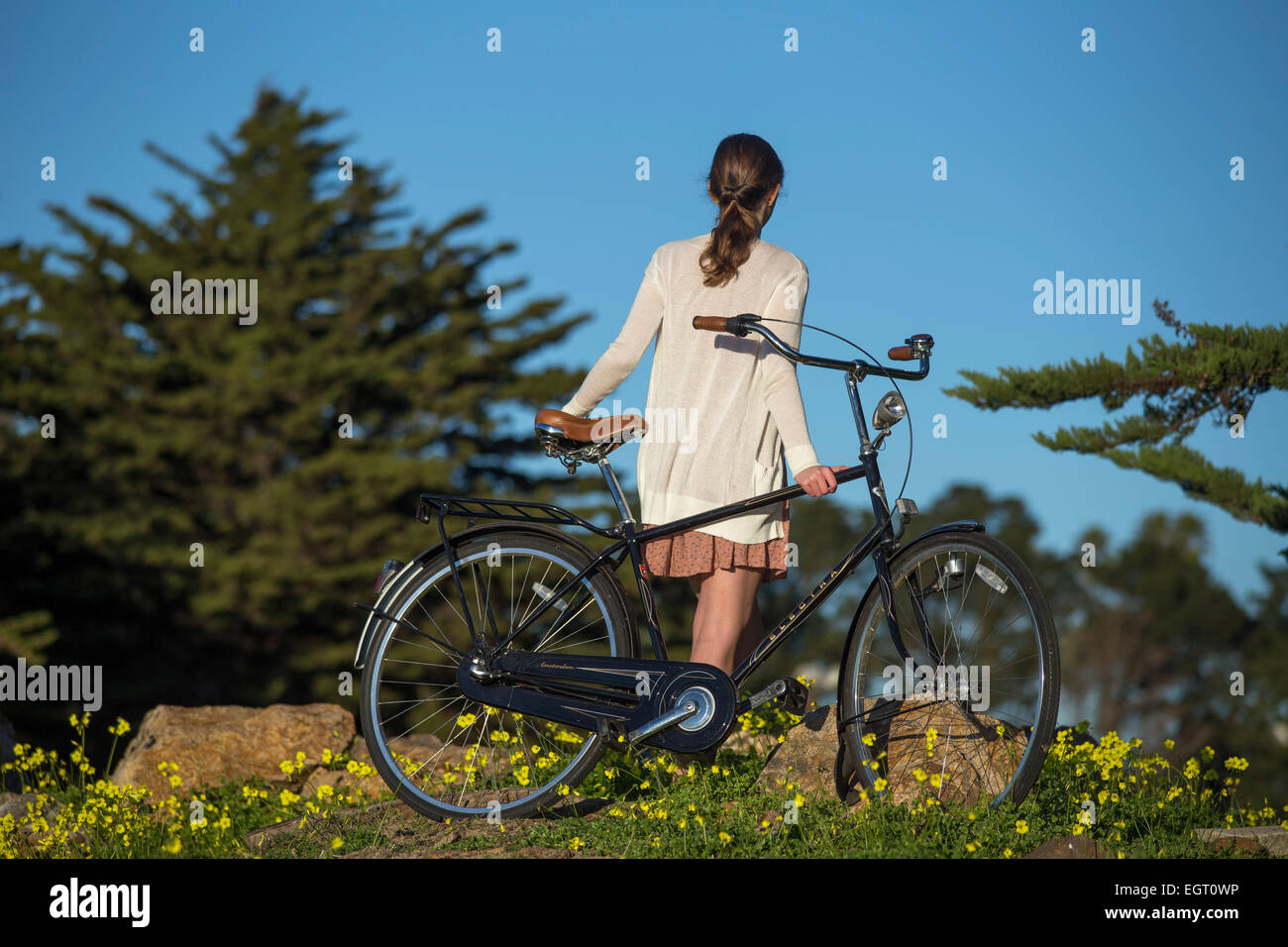 Girl with Bicycle Book Cover Concept Stock Photo
