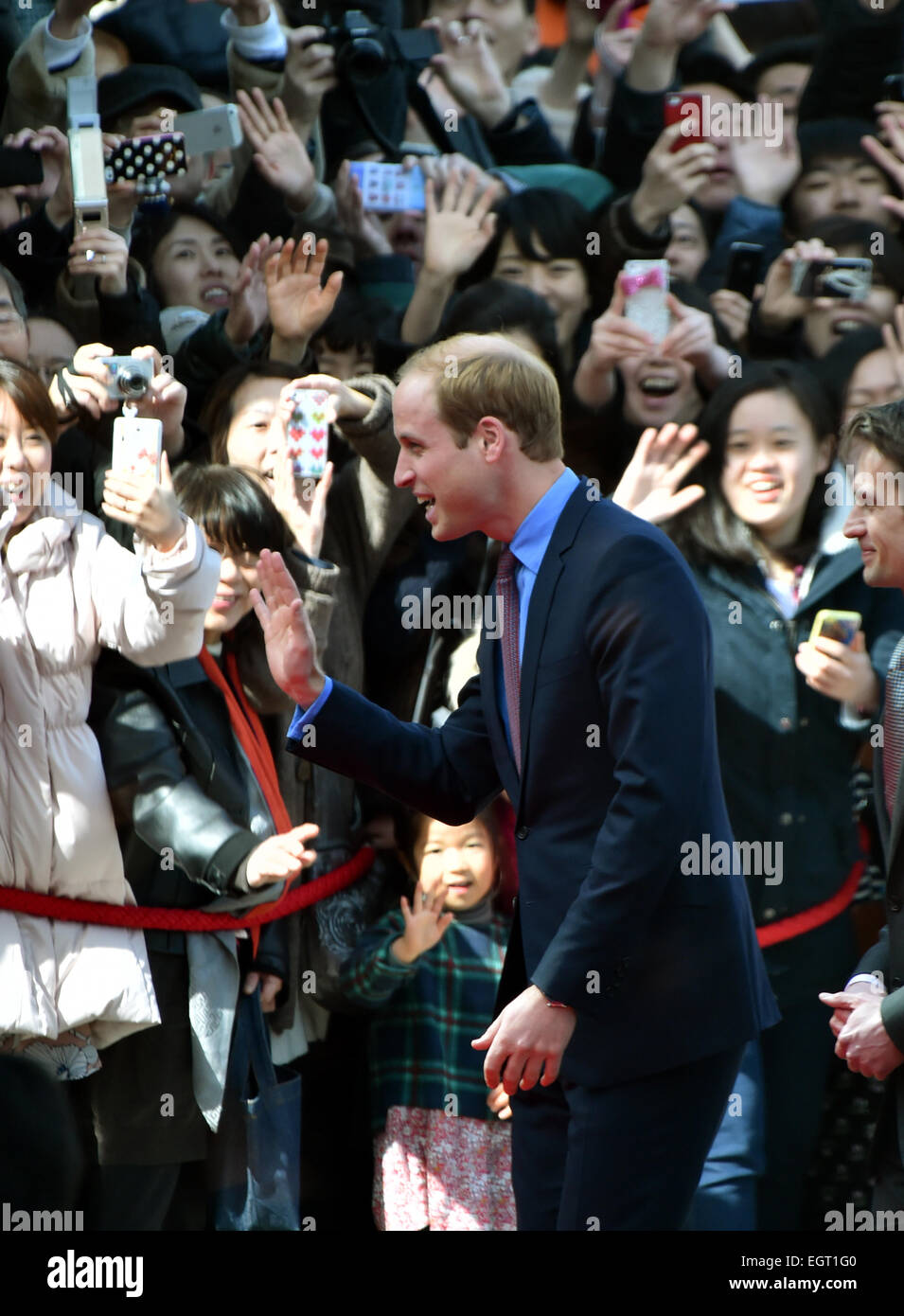 Tokyo, Japan. 28th Feb, 2015. Britain's Prince William is greeted by a throng of Japanese upon his visit to the British Fair in Tokyo's upscale Daikanyama neighborhood on Saturday, February 28, 2015. The second-in-line to the British throne arrived in Japan on Thursday without his pregnant wife, Duchess of Cambridge, on a four-day visit including a trip to Fukushima before leaving for Beijing on Sunday. © Natsuki Sakai/AFLO/Alamy Live News Stock Photo