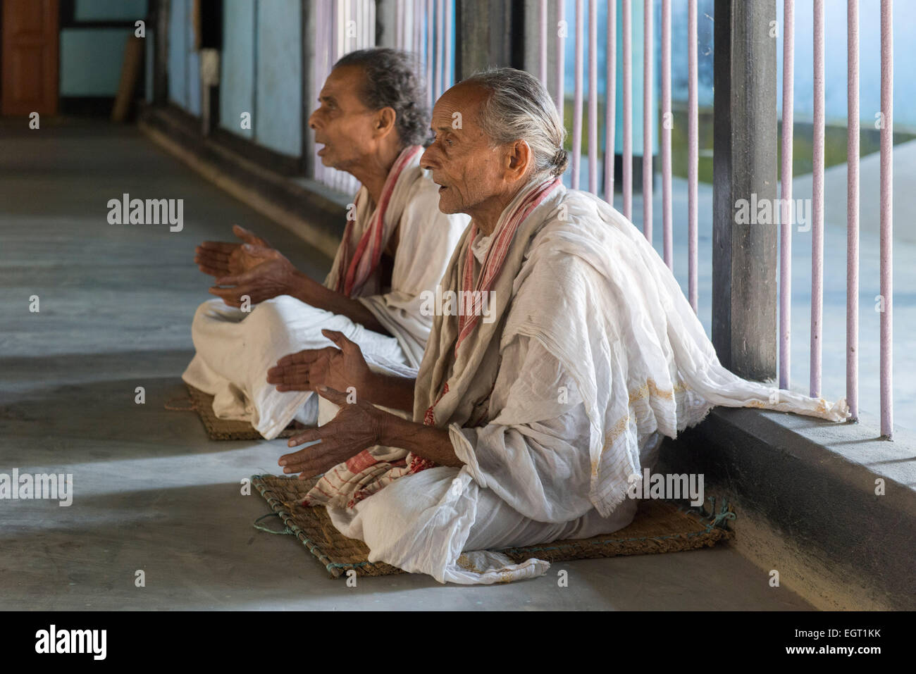 Old Monks Praying, Uttar Kamalabari Satra, Majuli Island Stock Photo