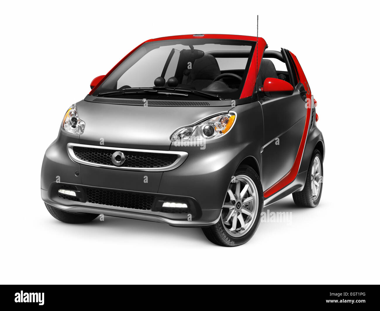 License available at MaximImages.com - 2015 Smart Fortwo Electric Drive Cabriolet electric car. Isolated on white background with clipping path. Stock Photo