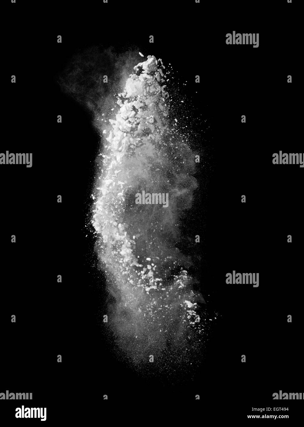 Freeze motion of white dust explosion isolated on black Stock Photo Alamy