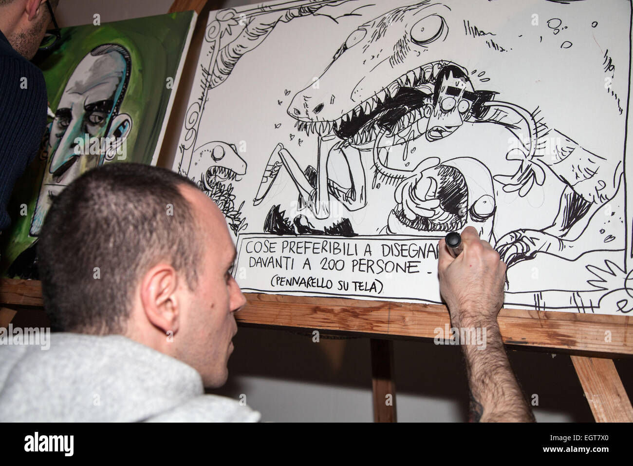 Zerocalcare (Aka Michele Rech) and a sample of his art work, the Italian cartoonist most followed at the moment, met his fans at TMO (Teatro Mediterraneo Occupato) to autograph his latest work 'Dimentica il mio nome' translated to 'Forget my name'. © Antonio Melita/Pacific Press/Alamy Live News Stock Photo