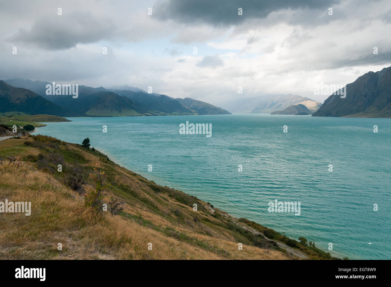 Lake Hawea and the Southern Alps, Otago, South Island, New Zealand. Stock Photo