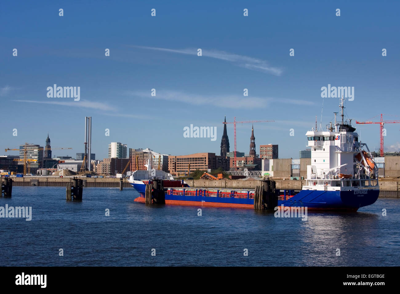 A cargo ship is at anchor in the harbor of Hamburg, Hamburg, Germany, Europe Stock Photo