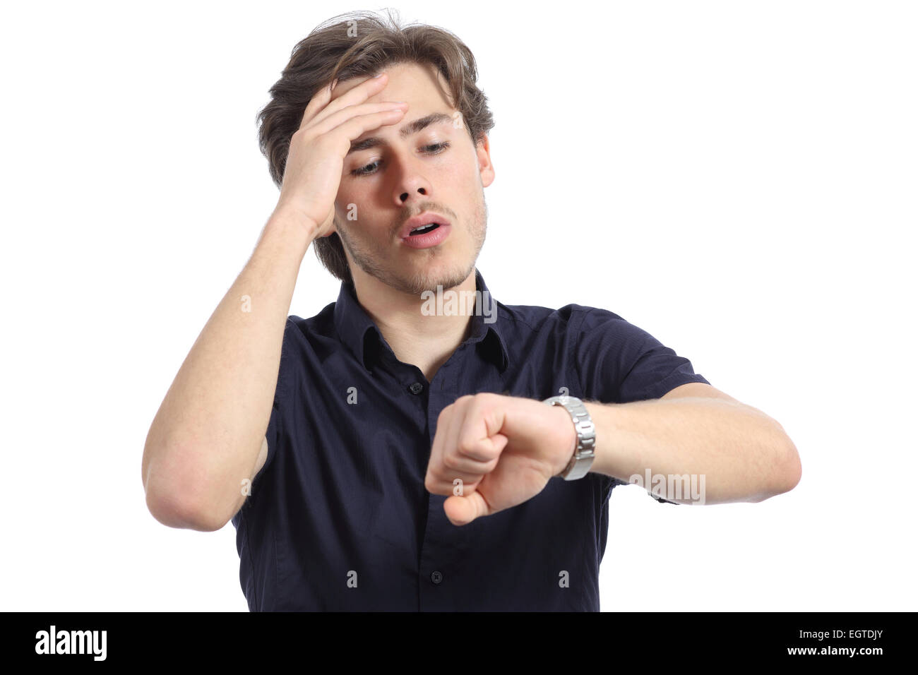 Worried man running out of time on a white background Stock Photo