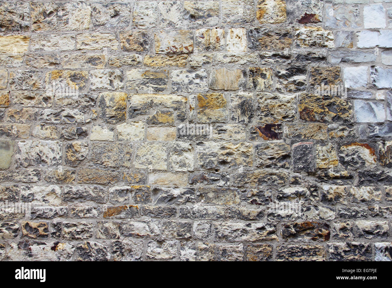 Old weathered light stone wall background texture Stock Photo - Alamy