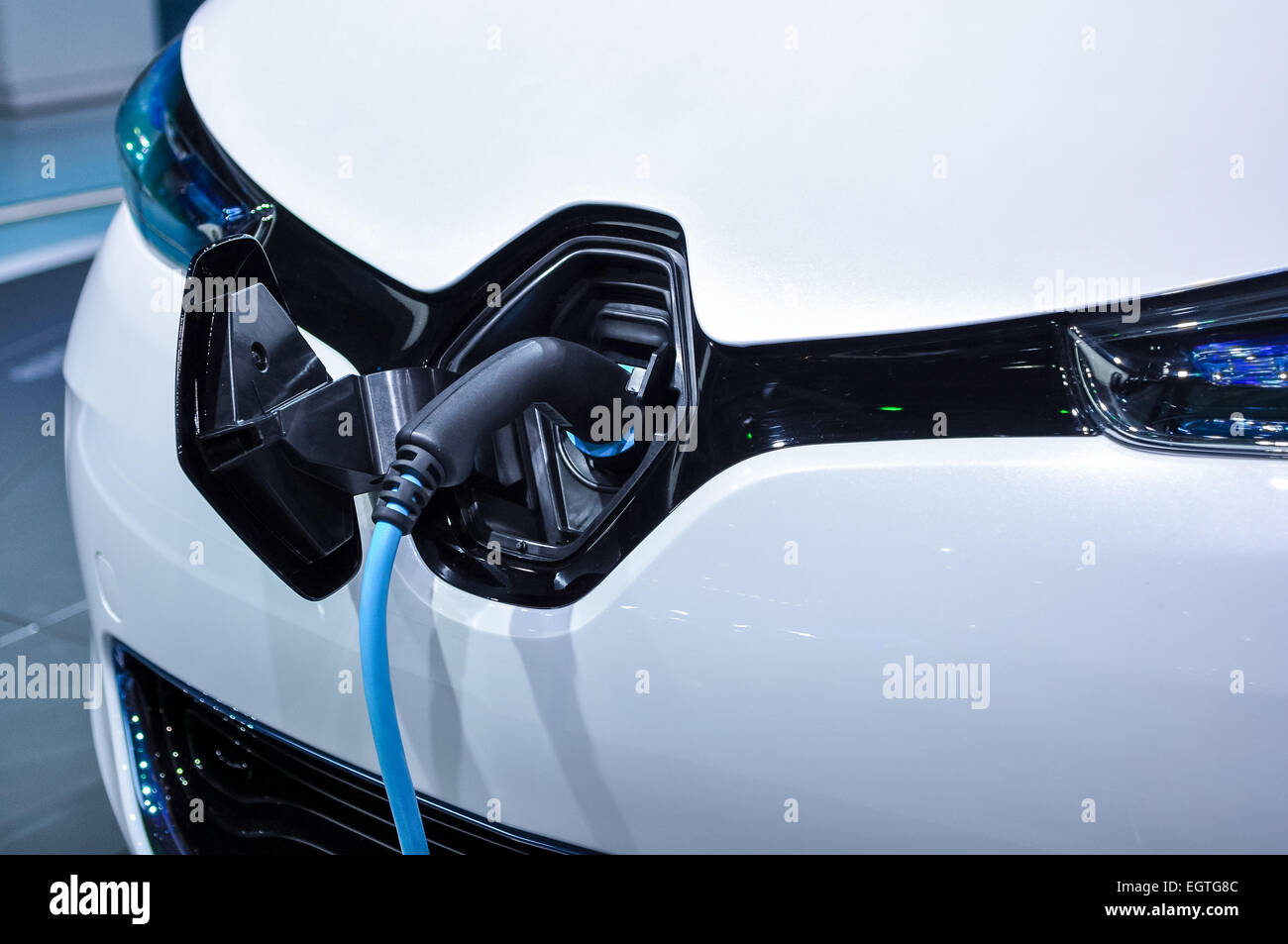 the electric vehicle charging cable inserted in plug Stock Photo Alamy