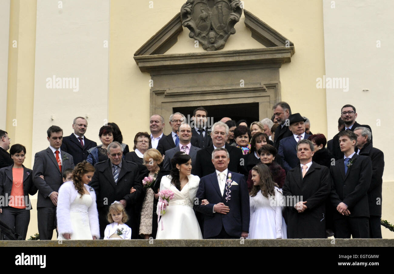 Head of the Presidential Office Vratislav Mynar, 47, married Czech Television (CT) presenter Alexandra Noskova, aged 31, with President Milos Zeman (behind the groom) serving as the best man at the ceremony today, on Saturday, February 28, 2015. Mynar is a businessman from Osvetimany, where he is also a member of the local town hall. The marriage was held in a church. Most guests to it, including Zeman, came together in a coach. All of them, including Zeman, were greeted by a glass of plum brandy. In the summer, a boy will be born to the newly-wed couple. Due to her romance with Mynar, Noskova Stock Photo