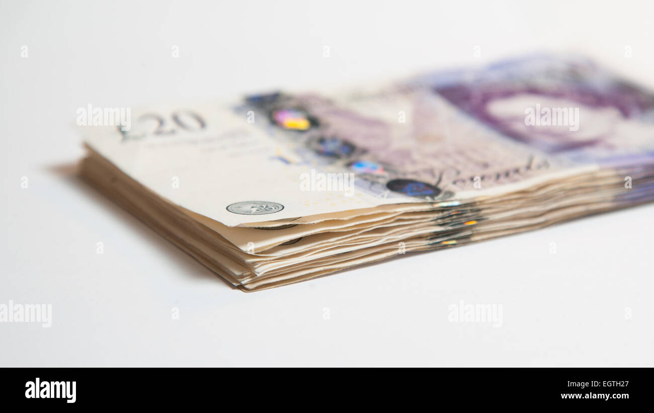 A pile of used UK Sterling Cash £20 and £10 notes Stock Photo - Alamy