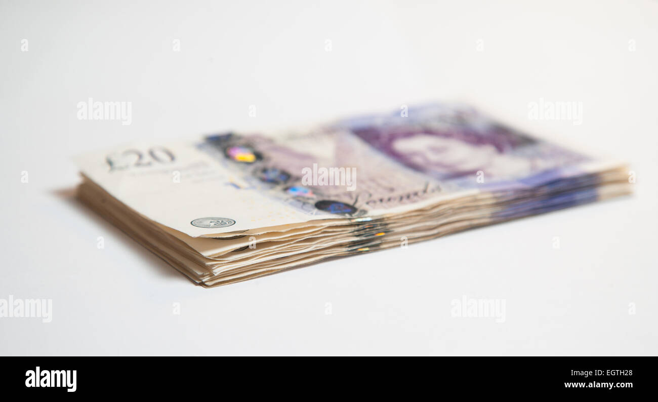A pile of used UK Sterling Cash £20 and £10 notes Stock Photo - Alamy