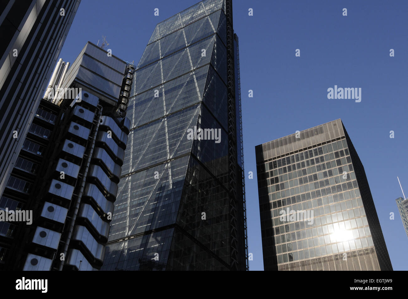 The Modern skyline of the City of London with The Cheesegrater and Lloyds of London Buildings London England Stock Photo