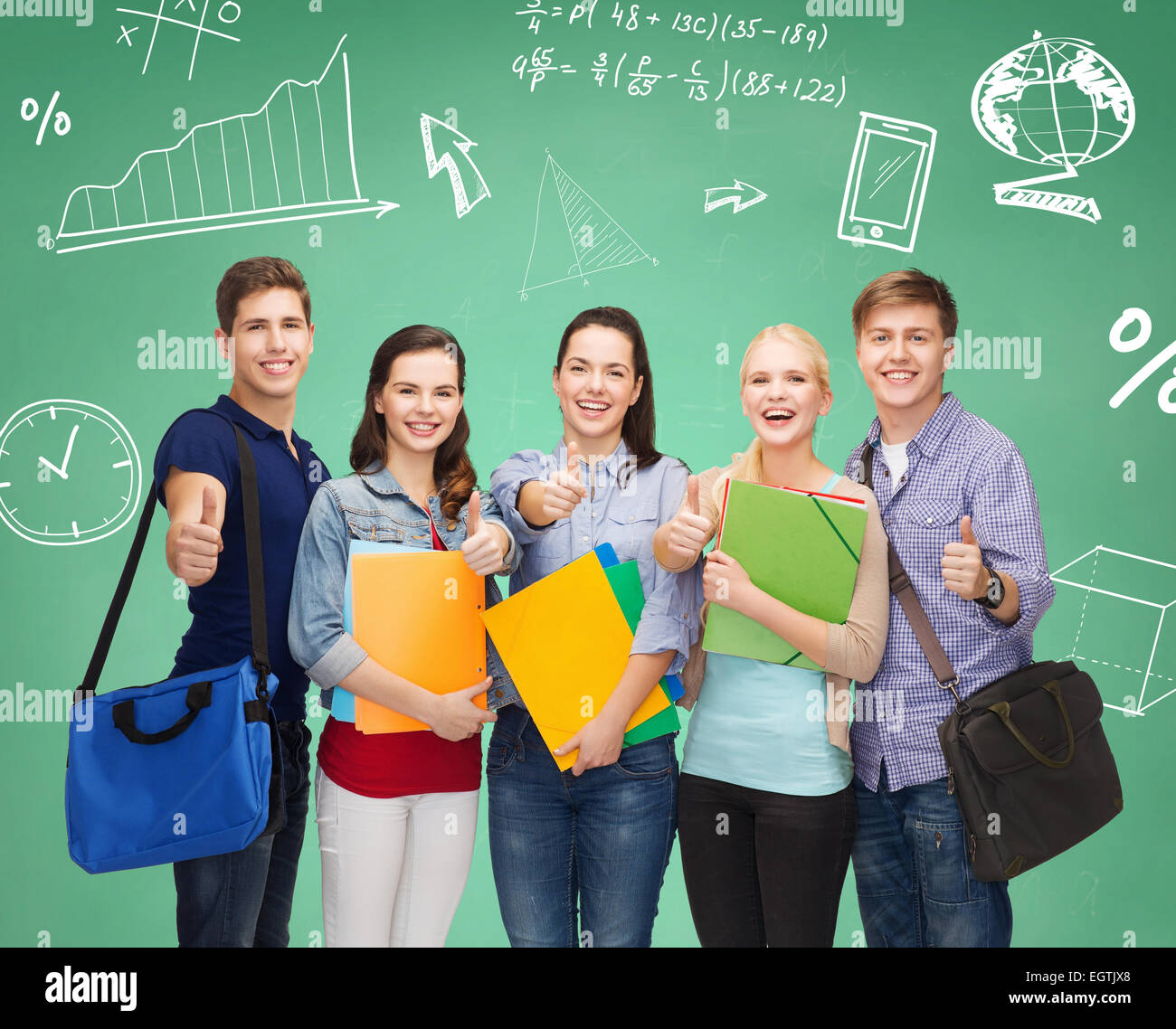 group of smiling students showing thumbs up Stock Photo - Alamy