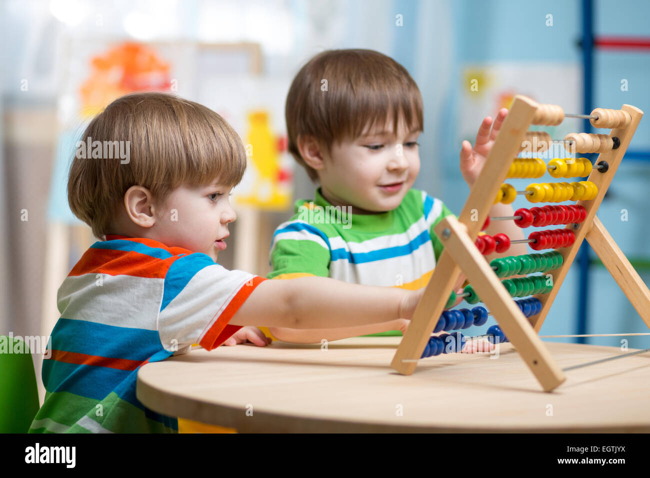 children playing with abacus Stock Photo