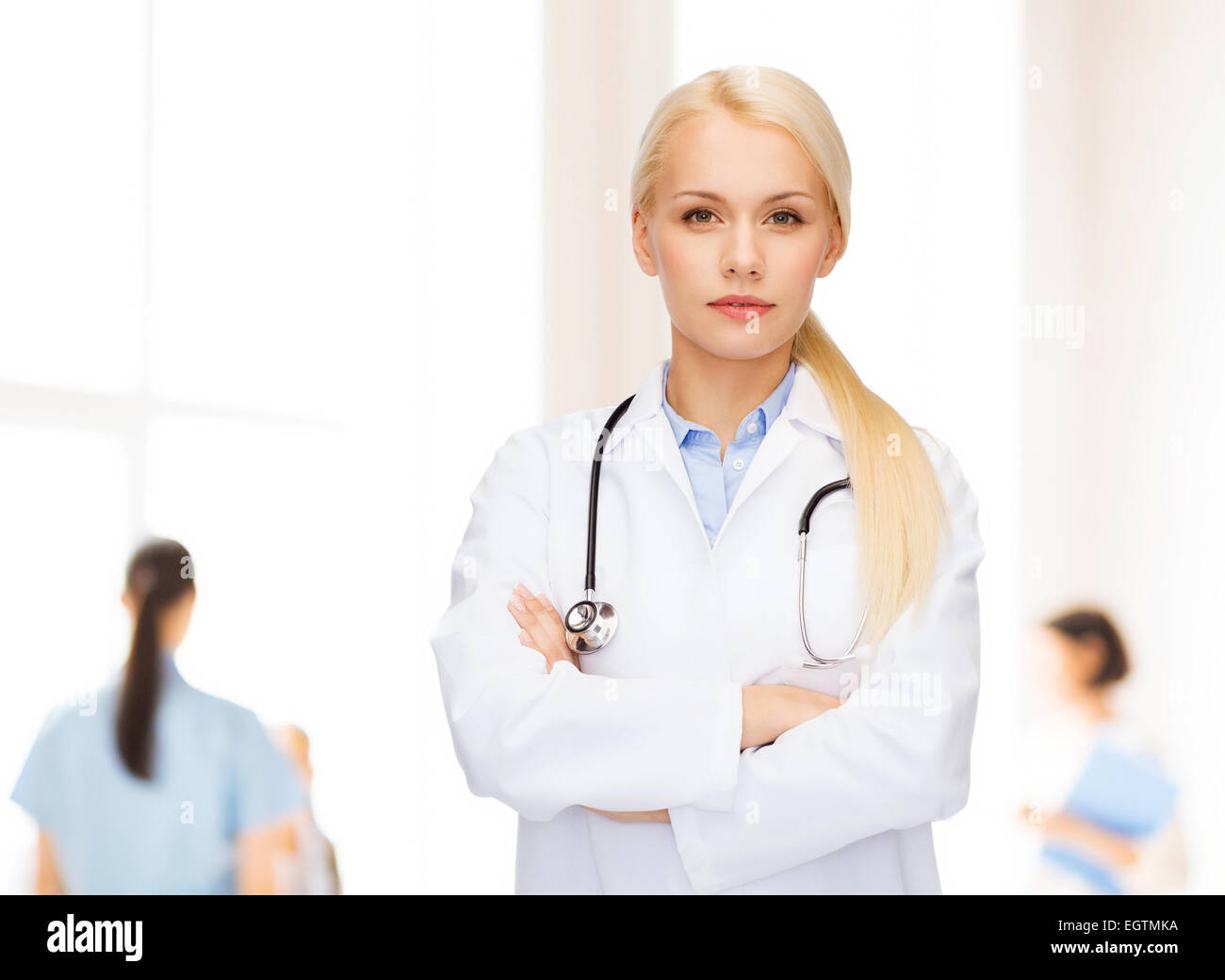 serious female doctor with stethoscope Stock Photo - Alamy