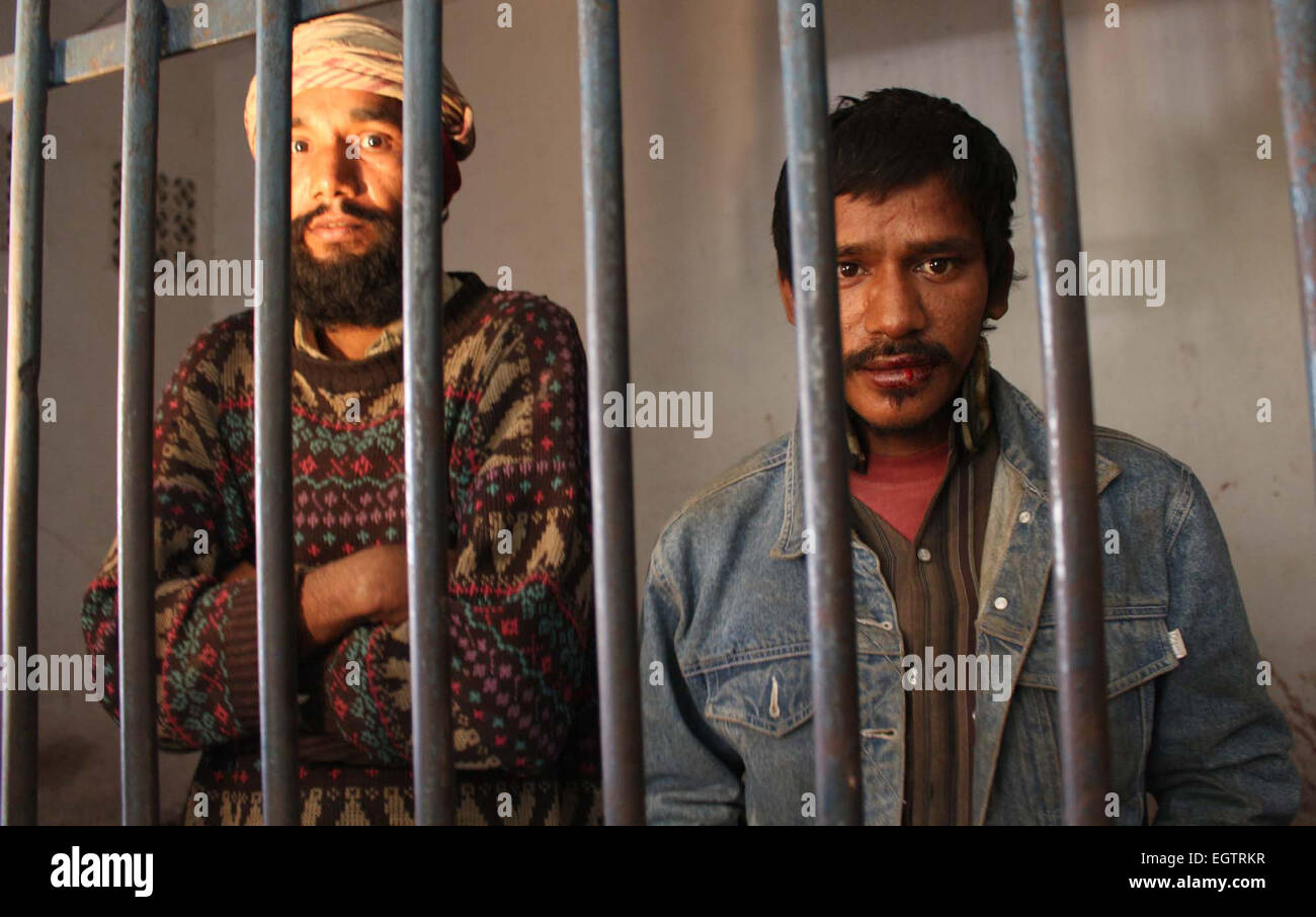 Karachi, Pakistan. 2nd March, 2015. Two butchers are imprisoning at