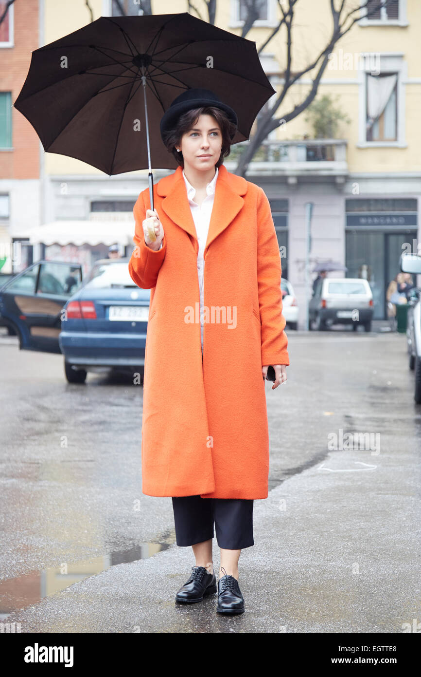Woman bowler hat coat hi-res stock photography and images - Alamy