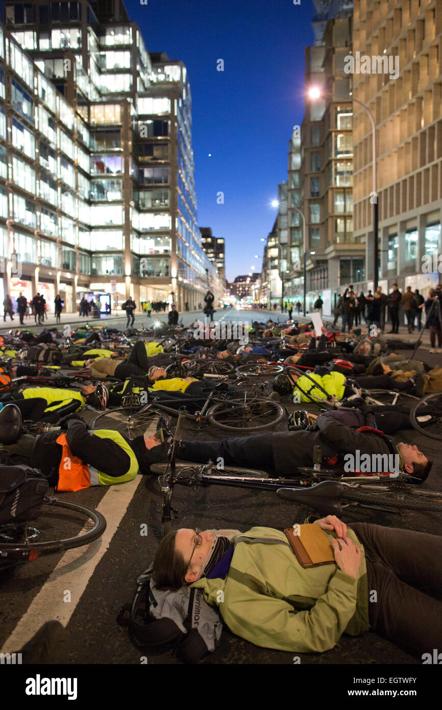 London, UK. 2nd March, 2015. Protest and VIgil Die-In to remember Claire Hitier-Abadie in Victoria, London, UK 02.03.2015 Die-in vigil after fourth cyclist to die in road accidents in London, on the capitals busy roads where cyclists are calling for safer roads. Credit:  Jeff Gilbert/Alamy Live News Stock Photo