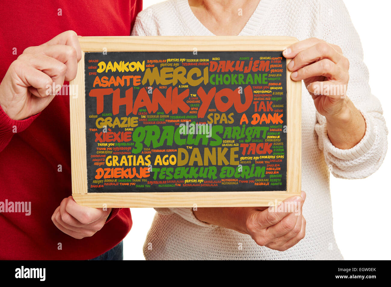Thank You in many different languages on a blackboard Stock Photo
