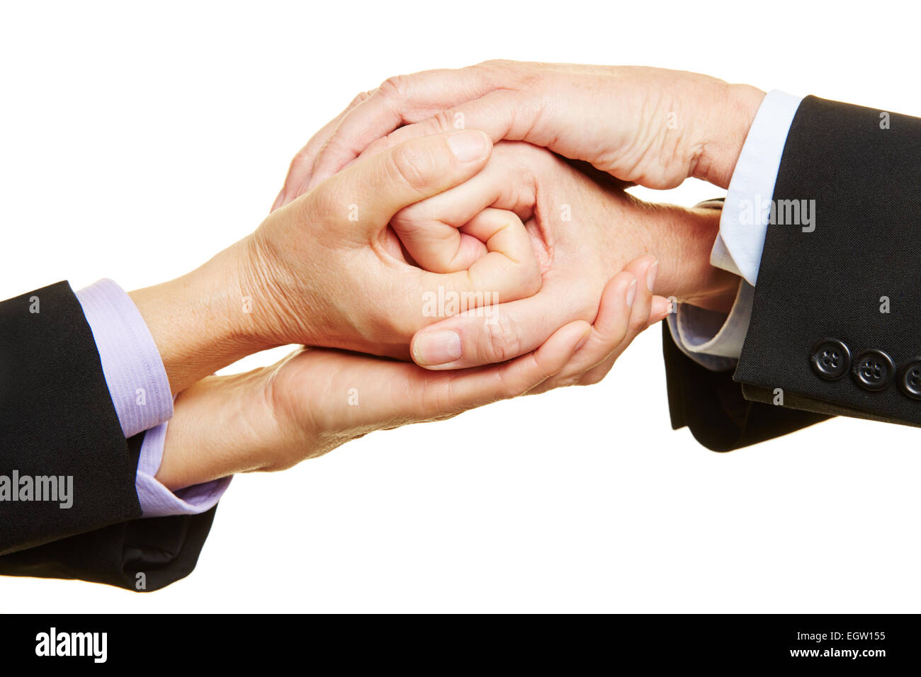 Two businesspeople folding hands together as a spiral Stock Photo Alamy