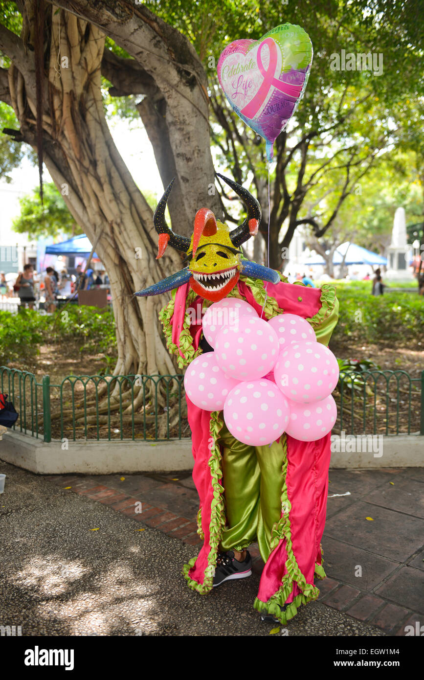 Masked cultural figure vejigante posing during the carnival in Ponce, Puerto Rico 2015 Stock Photo