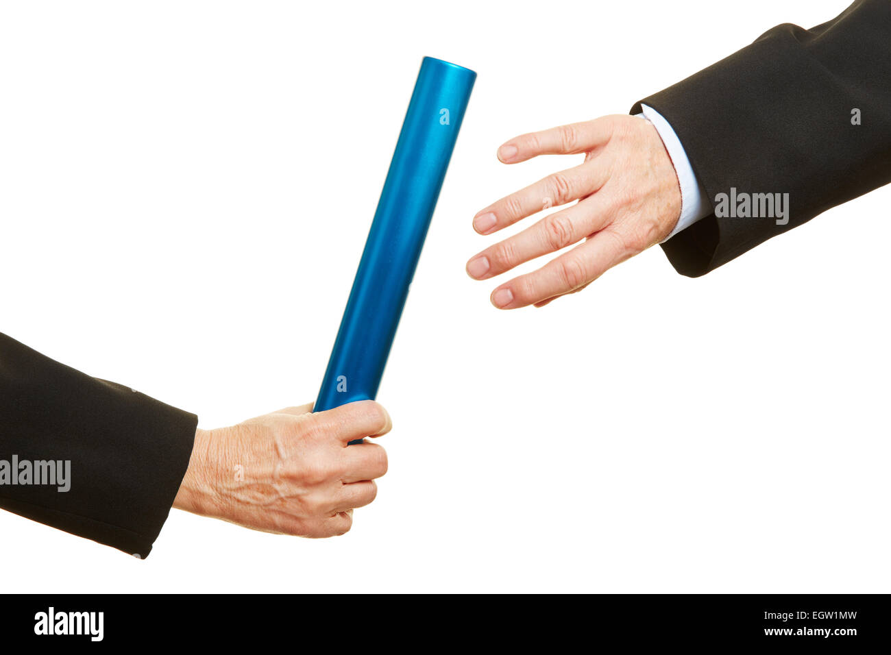 Hand offering and taking a relay baton during race Stock Photo