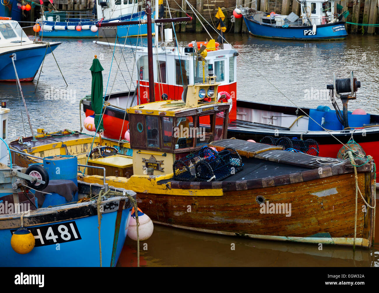 Fishing Boats moored in the harbour at West Bay a small port near Bridport on the Jurassic Coast in Dorset south west England UK Stock Photo
