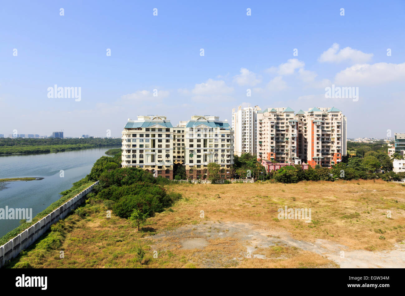 View of typical local apartment blocks on the seashore by the Adyar River estuary, Chennai, Tamil Nadu, southern India Stock Photo