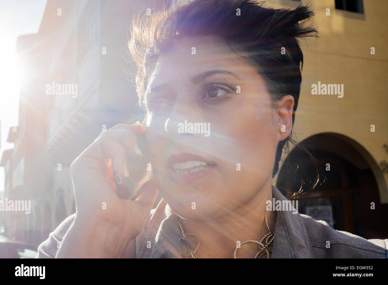 Upclose image of woman on cell phone. Stock Photo