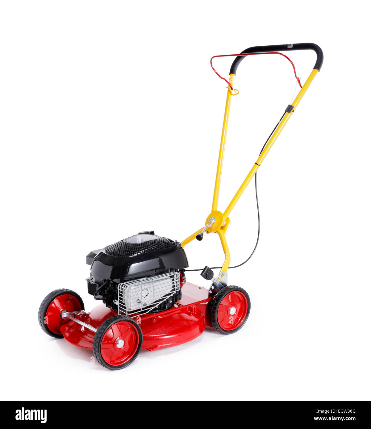 New red retro styled lawn mower isolated on white with natural shadows. Stock Photo