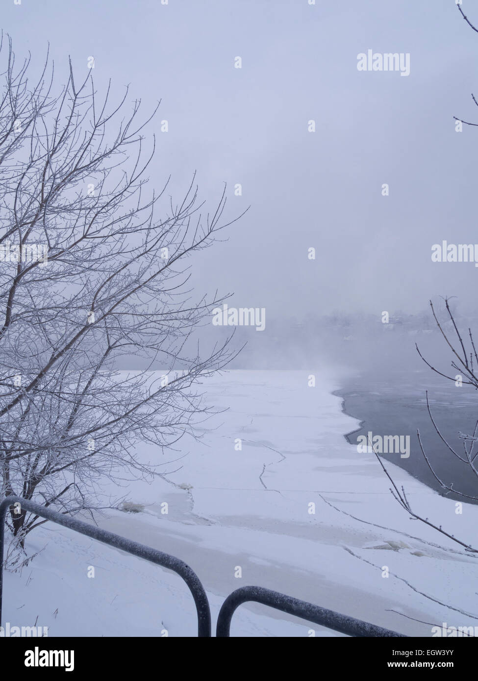 Fog on the river on an overcast day in winter Stock Photo