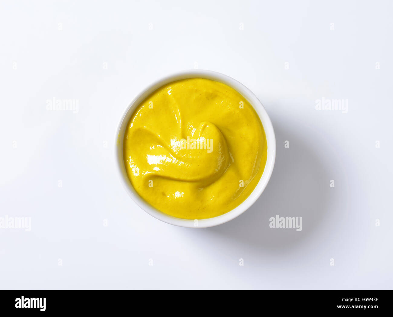 Bowl of smooth Dijon mustard Stock Photo Alamy