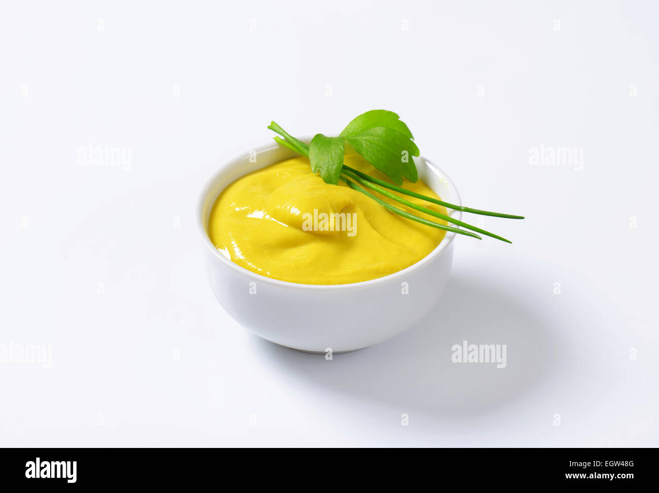 Bowl of smooth Dijon mustard Stock Photo Alamy
