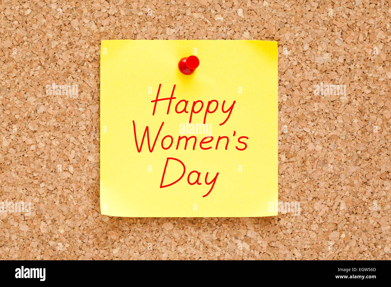 https://c8.alamy.com/comp/EGW56D/happy-womens-day-written-on-a-sticky-note-pinned-on-a-cork-bulletin-EGW56D.jpg