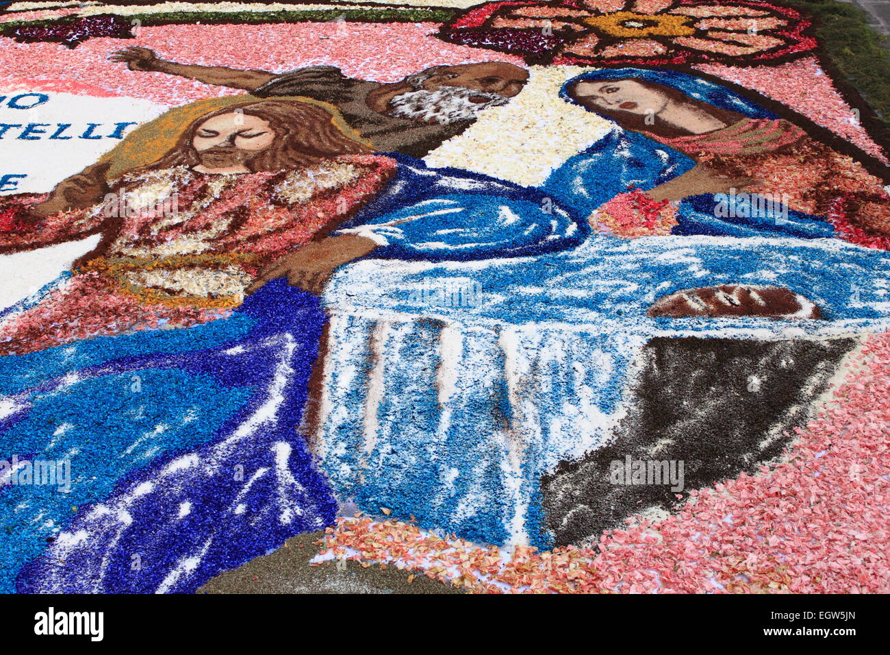 GENZANO, ITALY - JUNE 17: Floral Carpet with Jesus Christ and Virgin Mary on June 17, 2012 in Genzano, Italy. This event takes p Stock Photo