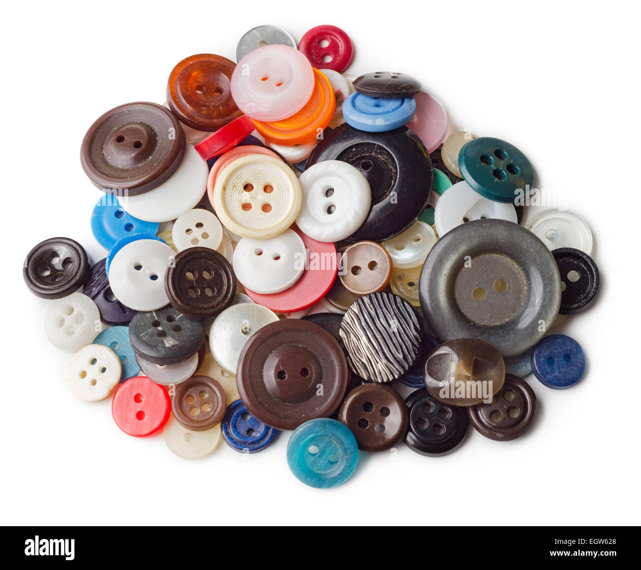 Pile of old and used clothes buttons isolated on white background Stock Photo